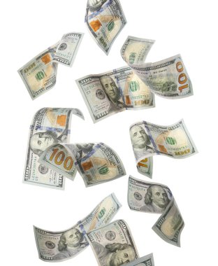 Para için. Dolar banknotları beyaz arkaplana düşüyor