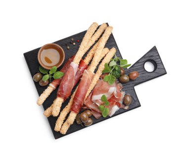 Beyaz üzerine izole edilmiş jambonlu, zeytinli ve ballı Grissini ekmeği.