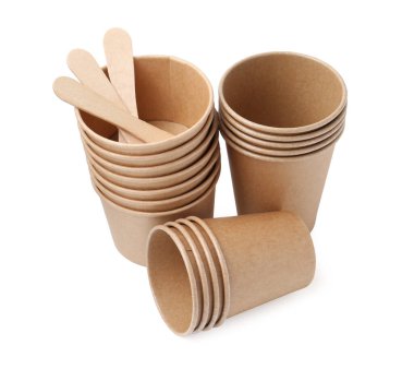 Set of disposable cups and wooden sticks isolated on white