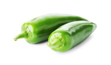 Two green jalapeno peppers isolated on white