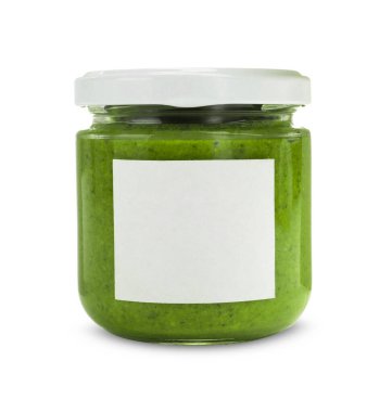 Fresh pesto sauce in jar isolated on white