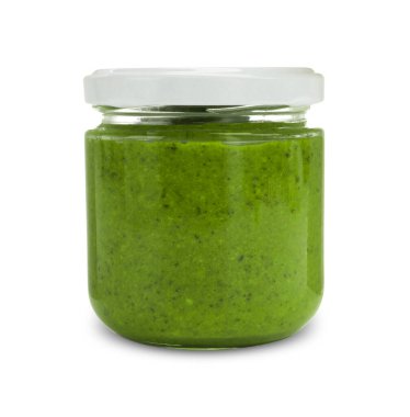 Fresh pesto sauce in jar isolated on white