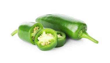 Pieces of green jalapeno pepper isolated on white