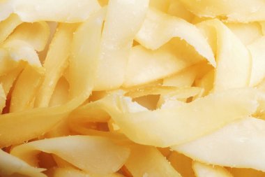 Tasty dried shredded squid as background, top view