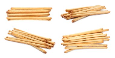 Delicious grissini sticks isolated on white, set