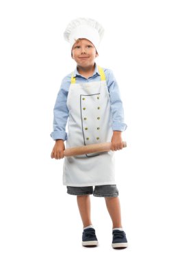 Meslek seçimi. Beyaz arka planda aşçı gibi davranan, oklavalı küçük çocuk.