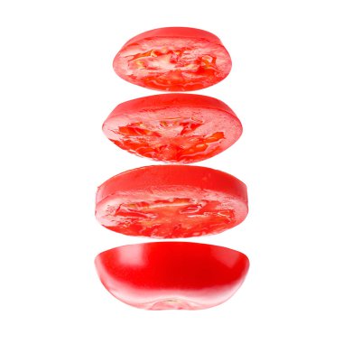 Sliced red tomato in air against white background