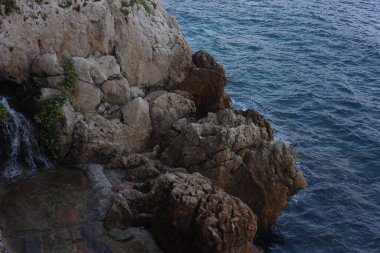 Beautiful view of cliff near wavy sea