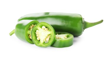 Pieces of green jalapeno pepper isolated on white