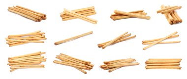 Delicious grissini sticks isolated on white, set