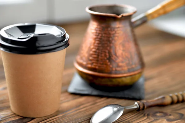 vintage coffee maker coffee glass on a wooden table by the windo