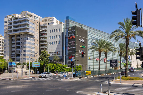 Azrieli Mall with logo sign and modern urban landscape in Givatayim, Israel. Sep 6, 2025