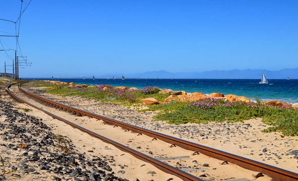 railway line along edge of False Bay, South Africa