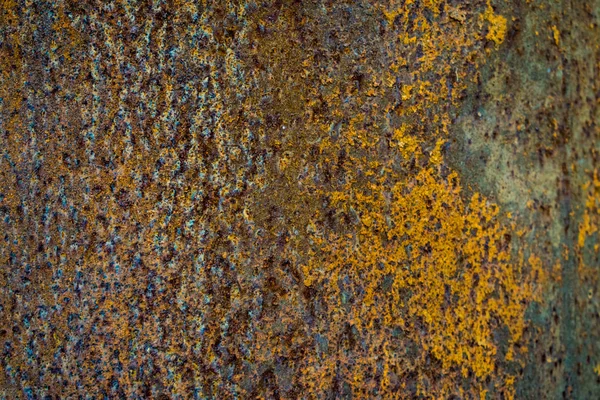 Corrosion, old metallic background with pronounced spots, weathered texture, brown and black rust