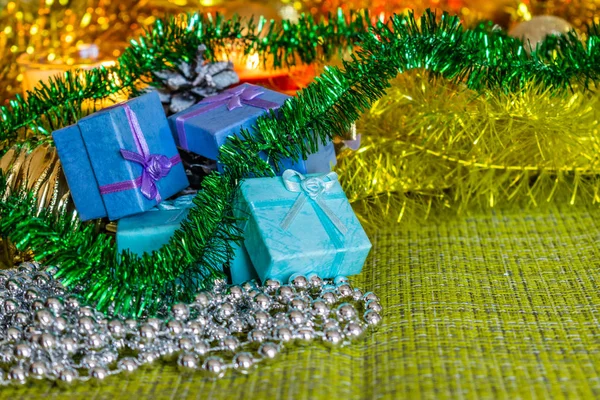 Colorful Small Gift Boxes Gifts Christmas Tinsel Shiny Toys Decorations — Stock Photo, Image