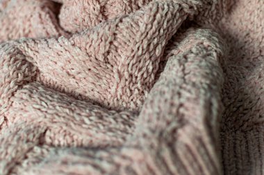 İnce desenli ve pembe renkli kumaş. Kabartmalı tekstil deseni, hoş ve narin, kadife gibi ve desenli tasarım ve dekorasyon için arka plan.