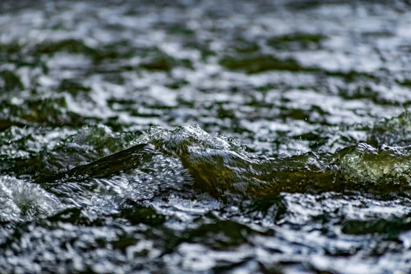 Fresh Water Motion Swirling Current Flying Spray Green Tint Light — Stock Photo, Image