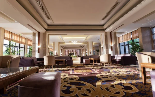 The interior of the hotel hall with cozy sofas and coffee tables for the convenience of waiting visitors