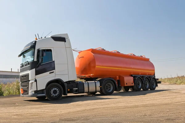 Truck Orange Tank Goes Knurled Unpaved Road Delivering Oil Products — Stock Photo, Image