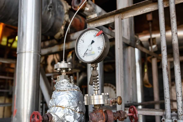 properly working pressure gauge installed on the pipeline at the