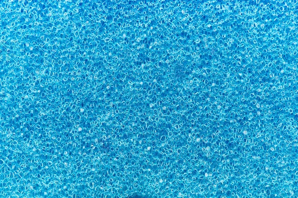 The texture surface of the abrasive synthetic fiber.