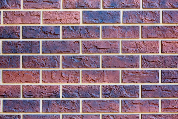 Background texture of colored brick wall.