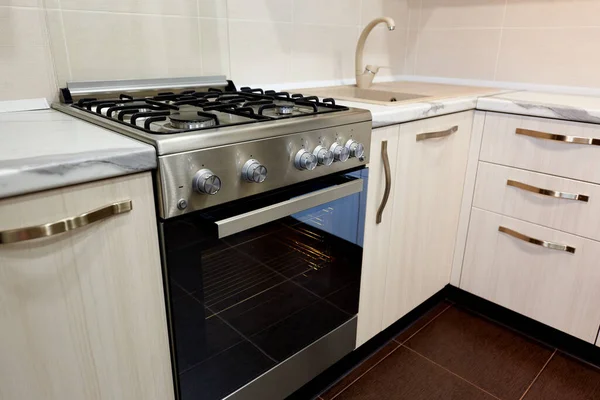 Oven on an empty kitchen in an apartment.