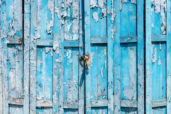 Detail Staré Ošuntělé Modré Dřevěné Dveře Pozadí — Stock fotografie