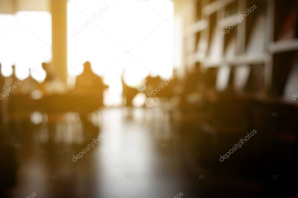 blur of people in coffee shop background