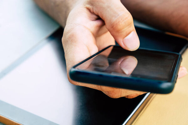 image of people using a smartphone. 