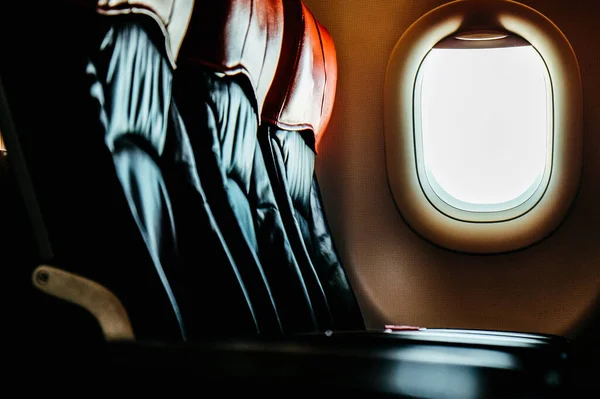 Image of Empty airplane seats and window. airplane interior Background