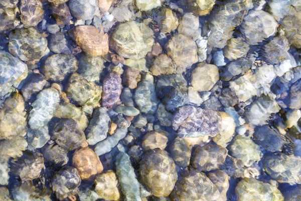 海滩的砾石作为背景 — 图库照片