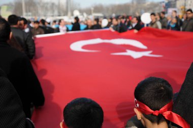 FEBRUARY 26,2012 ISTANBUL TURKEY.The protesters in Taksim Square protesting Khojaly tragedy happened in Azerbaijan by Armenians. clipart
