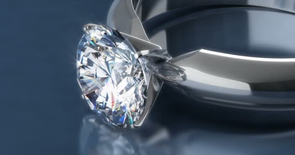 Diamantové prsteny Solitaire na modrém pozadí