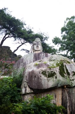 Andong, Kore'de bir Icheondong Stone Buddha Heykeli..