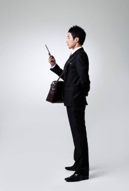 30'lu yıllarda Koreli bir adamın işadamı imajı.