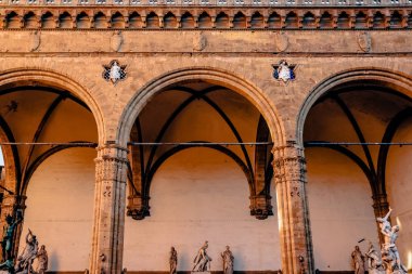 beautiful famous Loggia de Lanzi with antique statues in florence, italy clipart