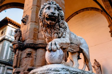 beautiful statue of lion at famous Loggia dei Lanzi in Florence, Italy