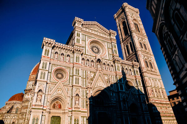 Duomo Cathedral with Giotto Bell Tower Facade in Florence, Italy