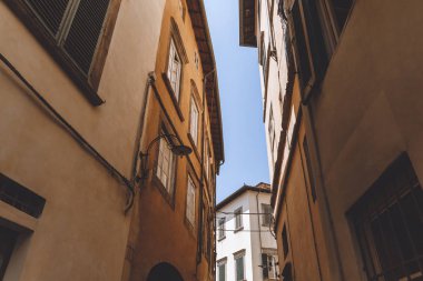 narrow street in old city, Pisa, Italy  clipart