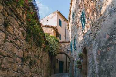 low angle view of buildings in Tuscany, Italy clipart