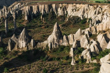 aerial view of scenic rock formations and majestic landscape in cappadocia, turkey clipart