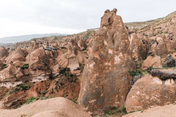 beautiful bizarre eroded rock formations in cappadocia, turkey 