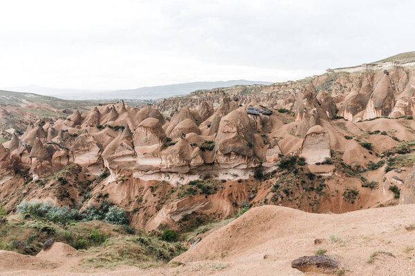 beautiful landscape with majestic rock formations in cappadocia, turkey