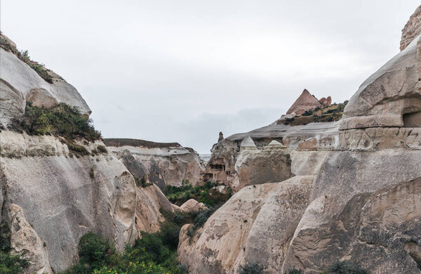 magestic view at bizarre rock formations in cappadocia, turkey
