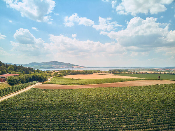 Aerial view of agricultural fields and sky with clouds, Czech Republic