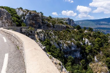 winding road in beautiful scenic mountains, provence, france clipart