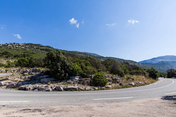 empty winding road in scenic mountains, provence, france 