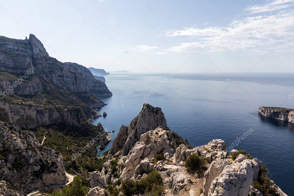 scenic landscape with beautiful calm sea and cliffs in Calanque de Sugiton, Marseille, France 