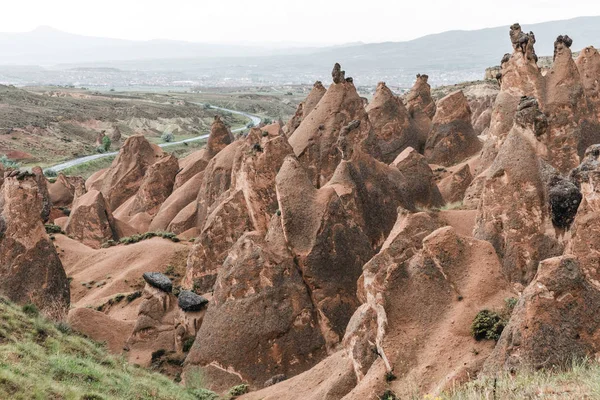 Aerial view of beautiful eroded rock formations at cloudy day, cappadocia, turkey — Stock Photo